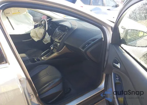 2012 Ford Focus Sel z USA, uszkodzony, nr VIN 1FAHP3M25CL156104